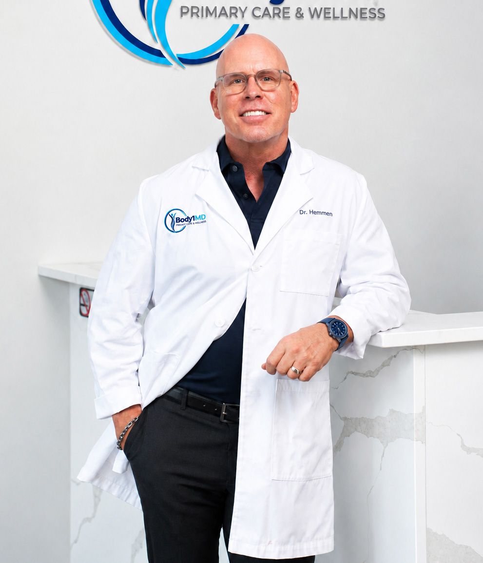 Dr. Andrew Hemmen in his white coat at Body1MD in Los Ranchos de Albuquerque
